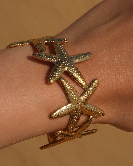 Goude verstelbare armband van zeesterren - stainless steel