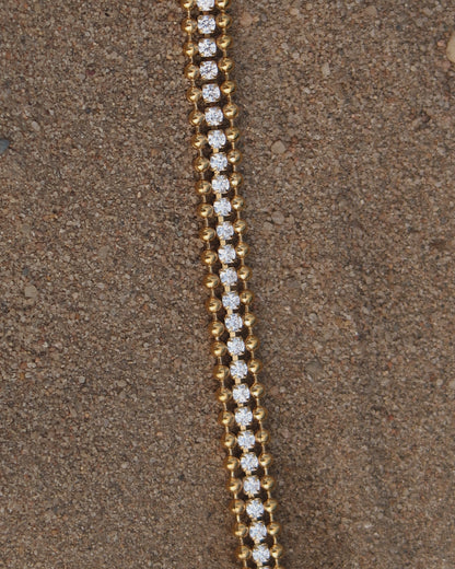 Goudkleurige armband met zilveren steentjes en verstelbare sluiting – stainless steel