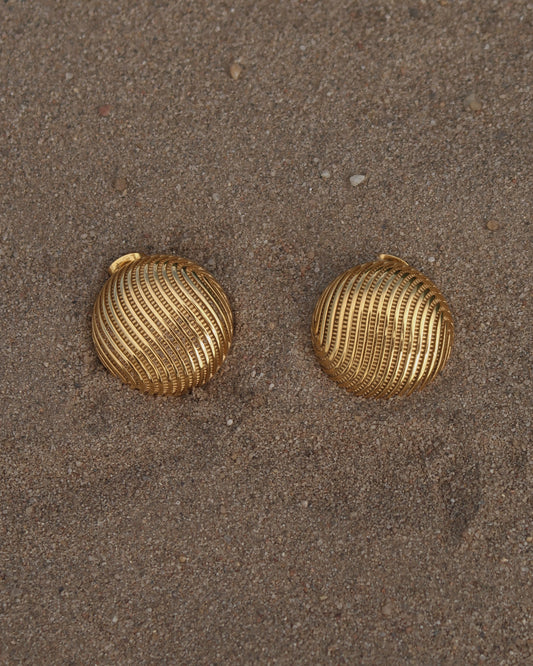 Gouden ronde oorbellen met subtiel reliëfpatroon, gemaakt van stainless steel