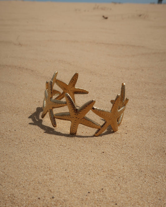 Goude verstelbare armband van zeesterren - stainless steel 