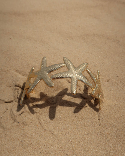 Goude verstelbare armband van zeesterren - stainless steel 