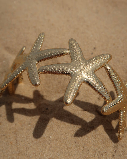 Goude verstelbare armband van zeesterren - stainless steel 