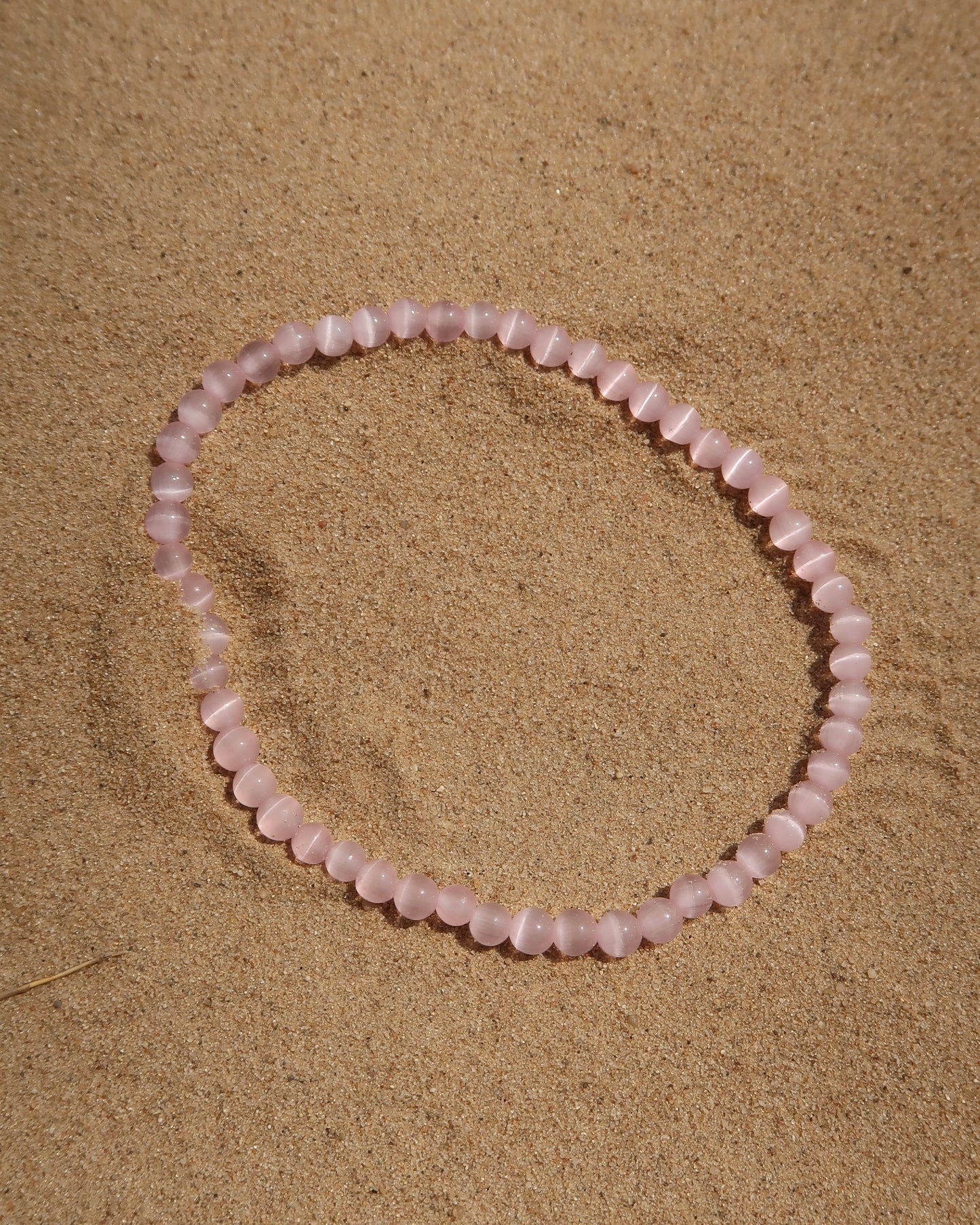 Roze Elastische armband van kralen 