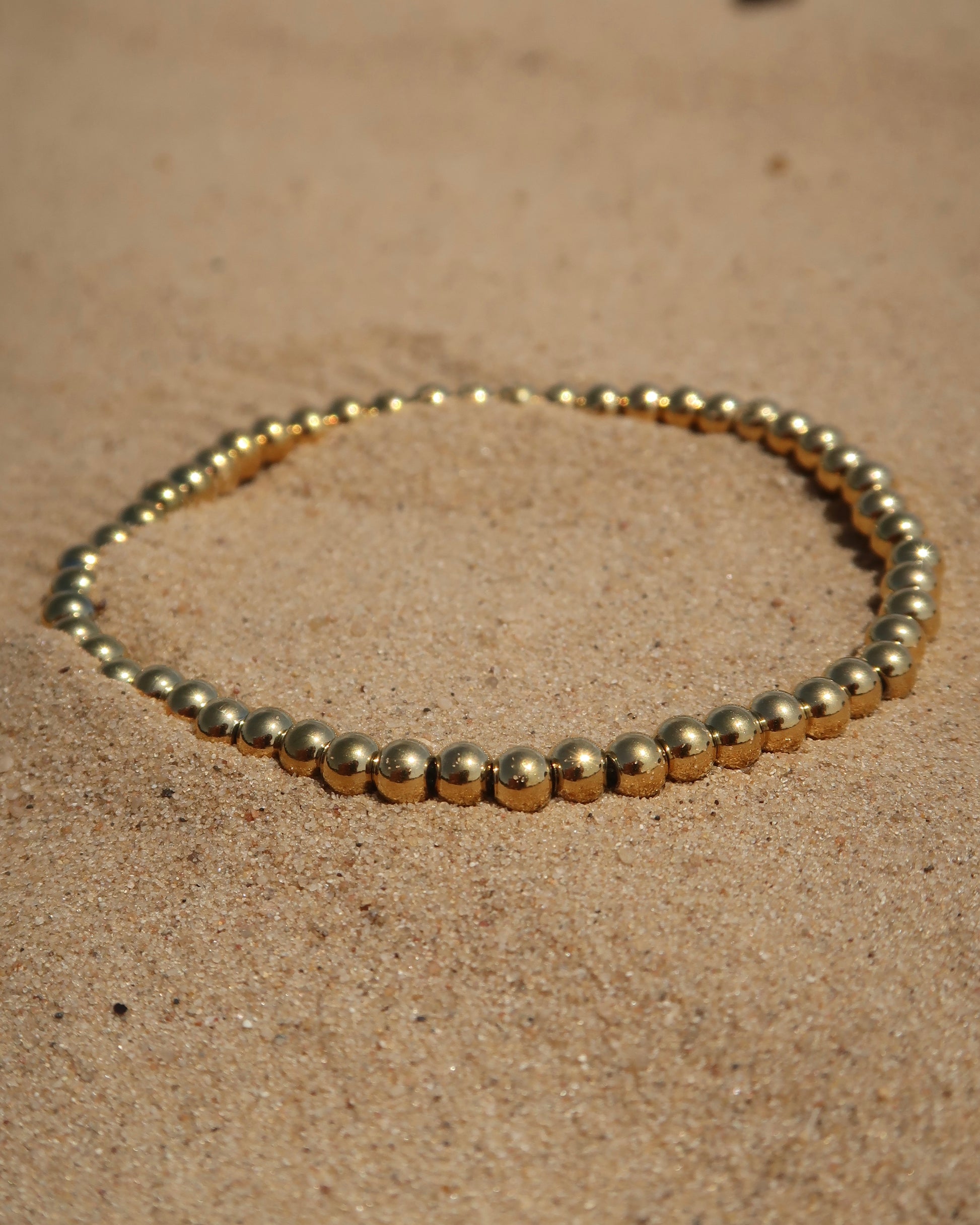 Gouden Elastische kralenarmband van stainless steel