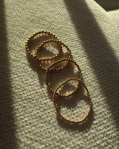 Gouden Elastische kralenarmband van stainless steel