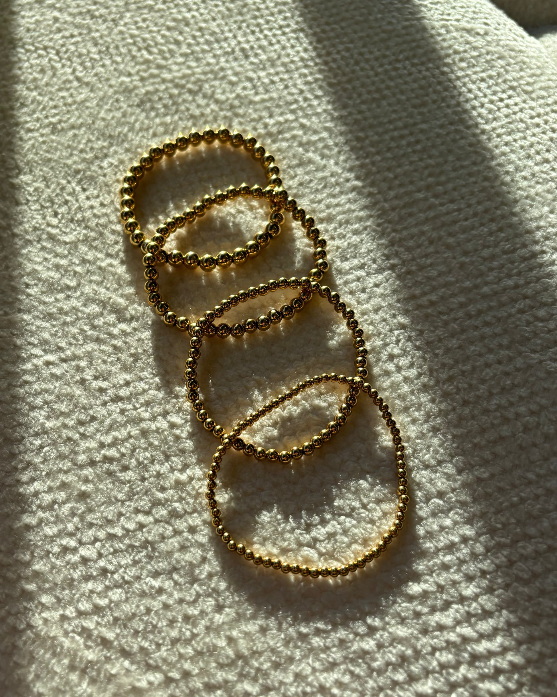 Gouden Elastische kralenarmband van stainless steel