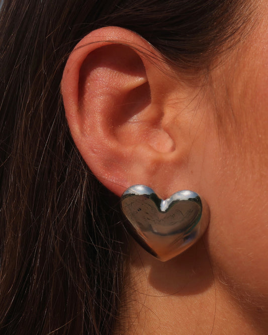 zilverkleurige stainless steel hartvormige statement oorbellen