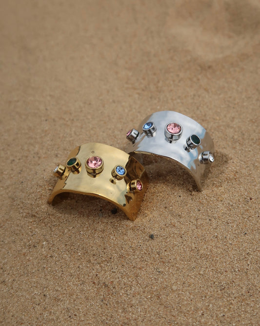 Lyon Ring: brede gouden of zilveren ring met kleurrijke stenen. Stainless steel en waterproof.
